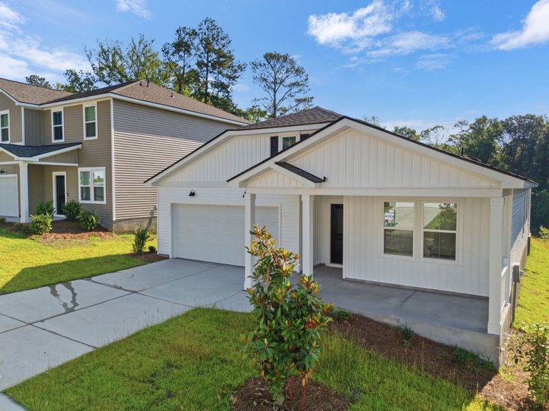 Front exterior of a new home in Grand Arbor, Blythewood, SC, highlighting curb appeal (Image 18). Front exterior of a new home in Grand Arbor, Blythewood, SC, highlighting curb appeal (Image 18).
