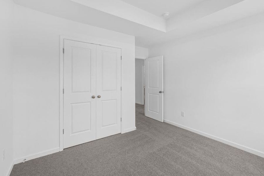 Spacious, unfurnished interior of a new home in Auburn Glen Towns, Dacula (Image 21).