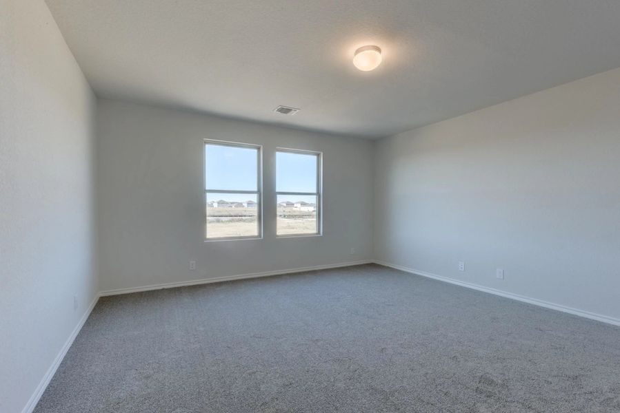 Representative unfurnished interior of a home built from the Dunlap by Ashton Woods in Meadows at Hennersby Hollow 40's, San Antonio (Image 20).