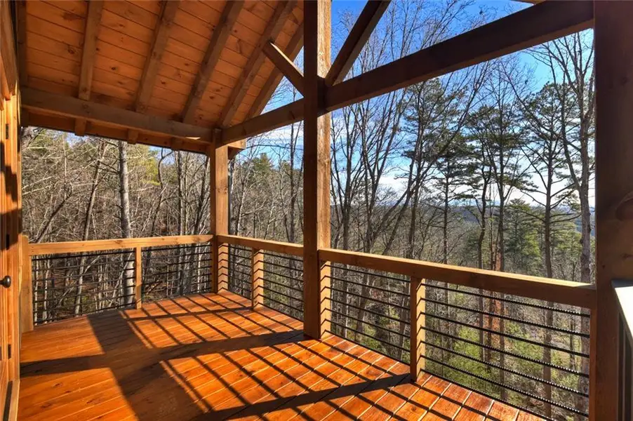 Exterior details and patio area of a home in , Ellijay (Image 26).