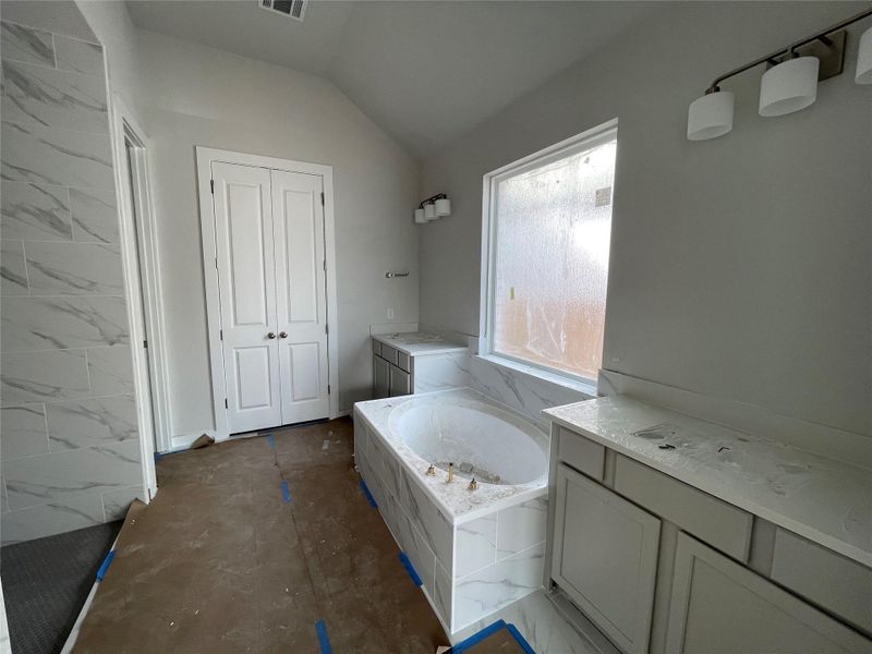 Primary Bath retreat with dual vanities & garden tub