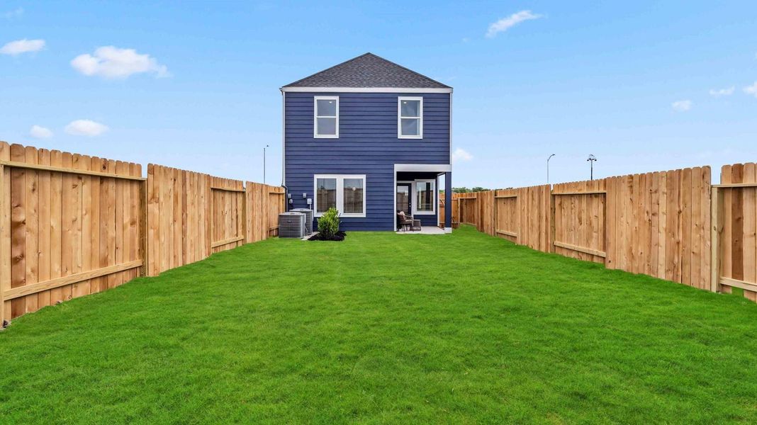 Front exterior of a new home in Grand West, Houston, TX, highlighting curb appeal (Image 1). Front exterior of a new home in Grand West, Houston, TX, highlighting curb appeal (Image 1).