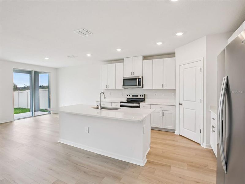 Furnished interior view inside a new home in Oakfield Trails - Classic Series, Parrish (Image 5).