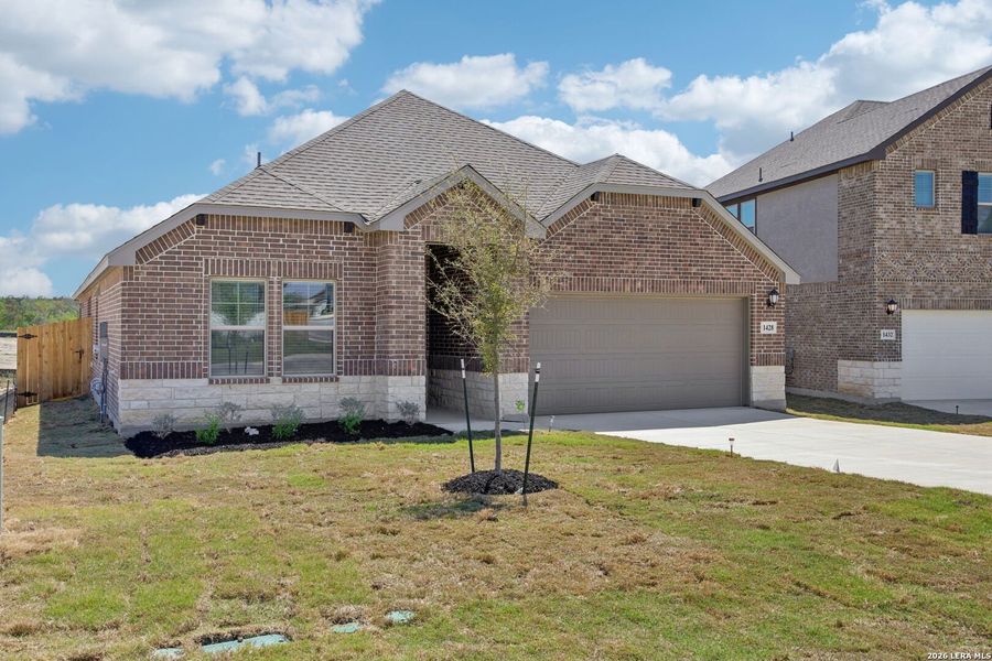 Front exterior of a new home in Arcadia Ridge - Classic Series, San Antonio, TX, highlighting curb appeal (Image 27).