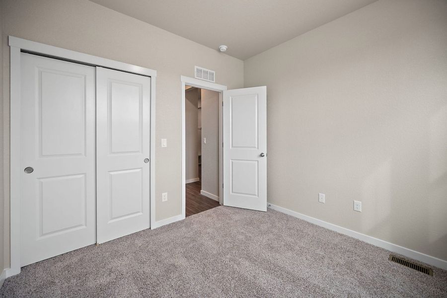 Spacious, unfurnished interior of a new home in Ridge at Lorson Ranch, Colorado Springs (Image 17).