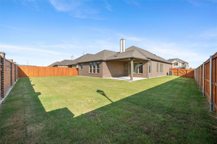 Exterior details and patio area of a home in Northstar, Haslet (Image 20).