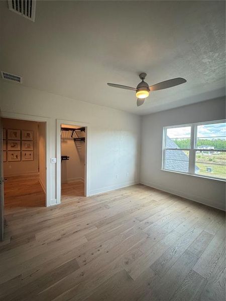 Spacious, unfurnished interior of a new home in Laureate Village, Newberry (Image 48).