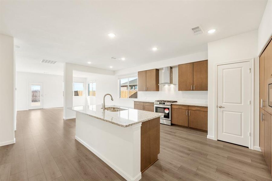 Furnished interior view inside a new home in East Oak Creek Elements, Commerce (Image 12).