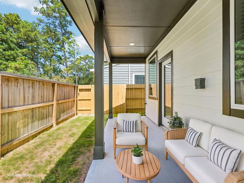 Exterior details and patio area of a home in Pinewood Trails - City Series, Atascocita (Image 28).