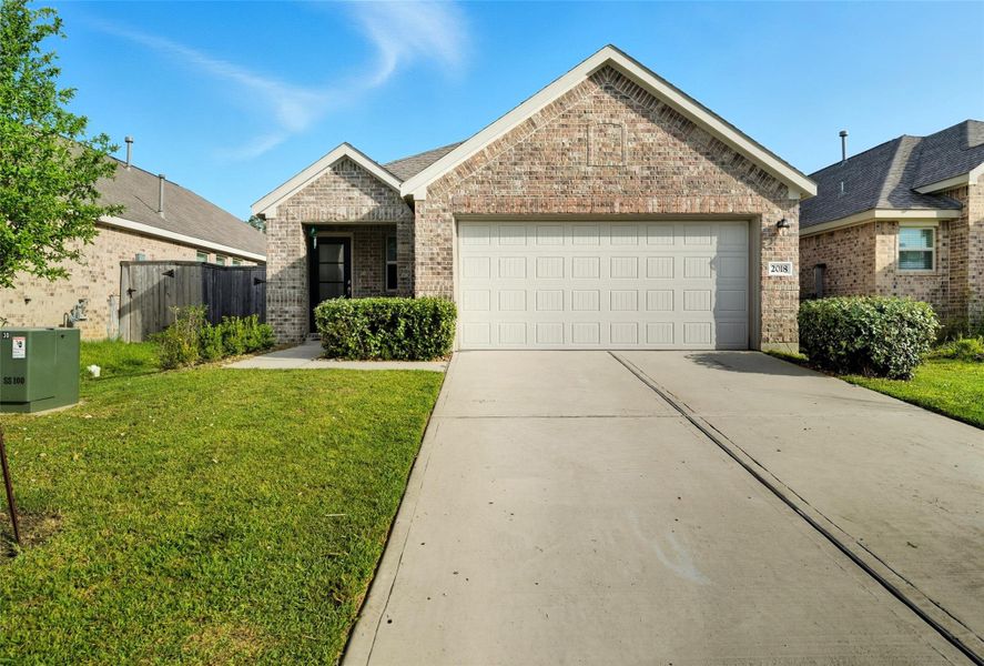 Front exterior of a new home in Newport Preserve, Crosby, TX, highlighting curb appeal (Image 13). Front exterior of a new home in Newport Preserve, Crosby, TX, highlighting curb appeal (Image 13).