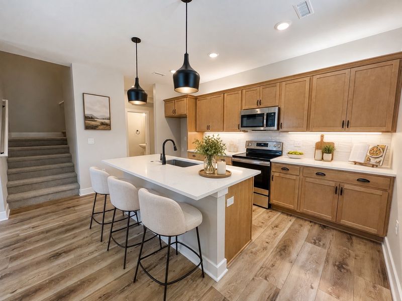 Representative furnished interior of a home built from the Hawthorne by Perfection Builders in Heritage Commons, Andover (Image 4).