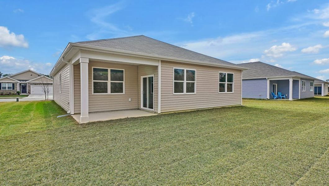 Representative exterior photo of a completed home built from the ARIA by D.R. Horton in Bella Point, Bolivia, NC (Image 17).
