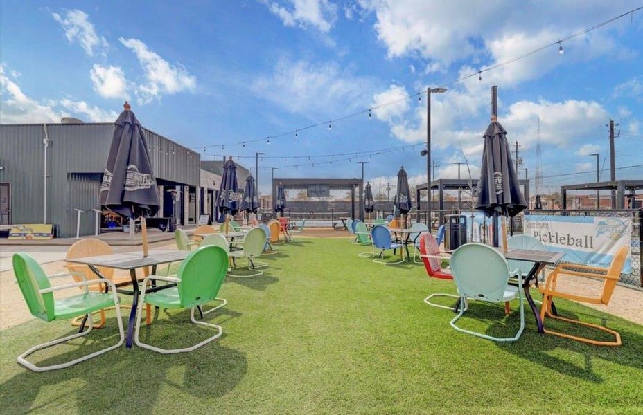 Location Spotlight: The Urban Athlete. A snapshot of the incredible recreational atmosphere nearby frames the high-growth lifestyle awaiting the future buyers of 1806 Line Street. Tucked perfectly into the booming Hardy Yards corridor, this modern property grants immediate inner-loop proximity to premier indoor and outdoor pickleball courts, local craft brewpubs, and major sports stadiums. Secure your piece of the city's most fast-paced, social district today!
