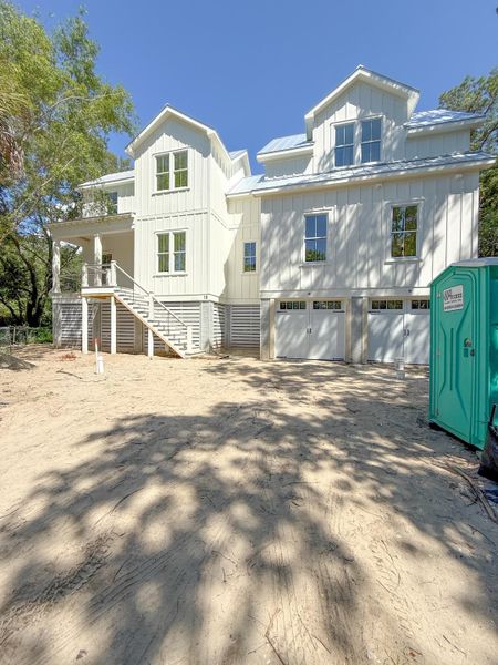 Front exterior of a new home in , Isle Of Palms, SC, highlighting curb appeal (Image 31). Front exterior of a new home in , Isle Of Palms, SC, highlighting curb appeal (Image 31).