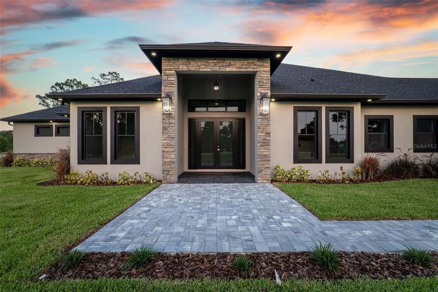 Front exterior of a new home in , Malabar, FL, highlighting curb appeal (Image 29).