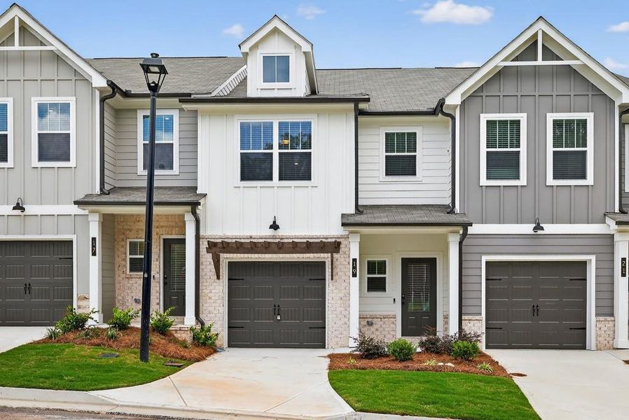 Front exterior of a new home in Medlock Park, Austell, GA, highlighting curb appeal (Image 22).