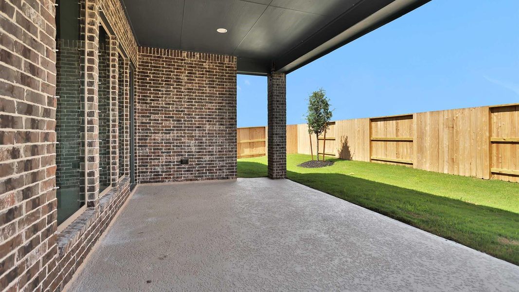 Exterior details and patio area of a home in Meridiana, Manvel (Image 3). Exterior details and patio area of a home in Meridiana, Manvel (Image 3).