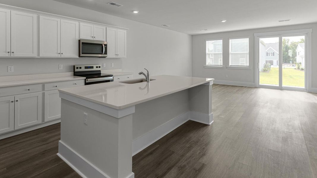 Representative furnished interior of a home built from the TILLMAN by D.R. Horton in The Preserve at Tidewater, Sneads Ferry (Image 8).