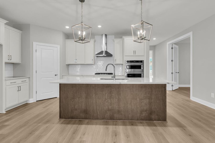 Furnished interior view inside a new home in Tidewater at Lakes of Cane Bay, Summerville (Image 11).