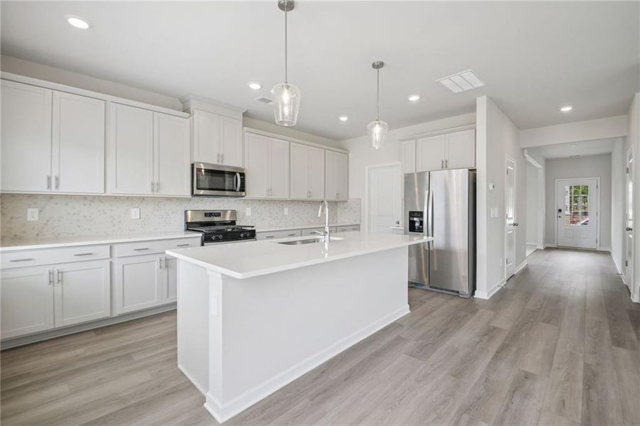 Furnished interior view inside a new home in Northwoods at Mirror Lake, Villa Rica (Image 20).