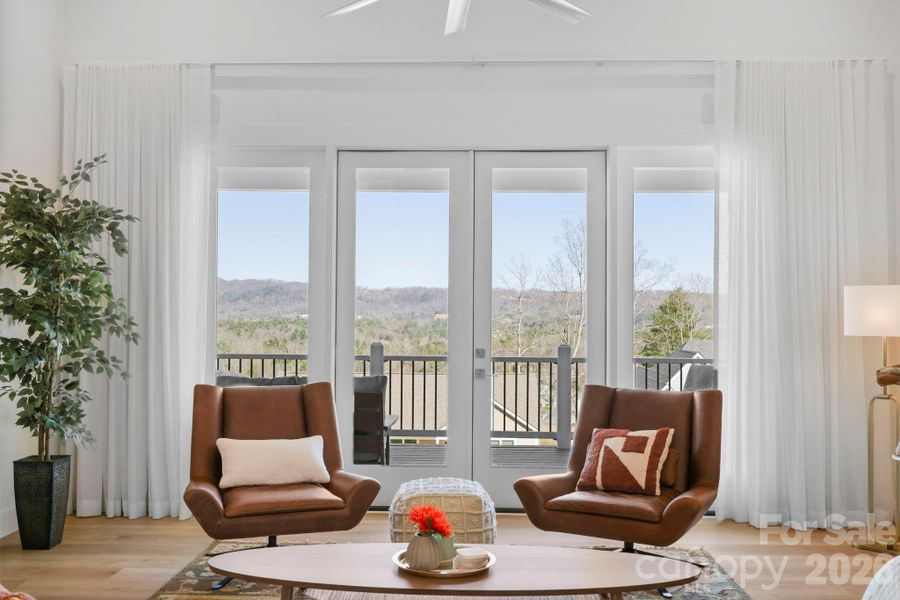 looking out to deck and mountains from living room