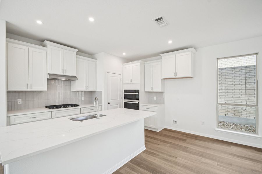 Furnished interior view inside a new home in Crosswinds, Kyle (Image 5).
