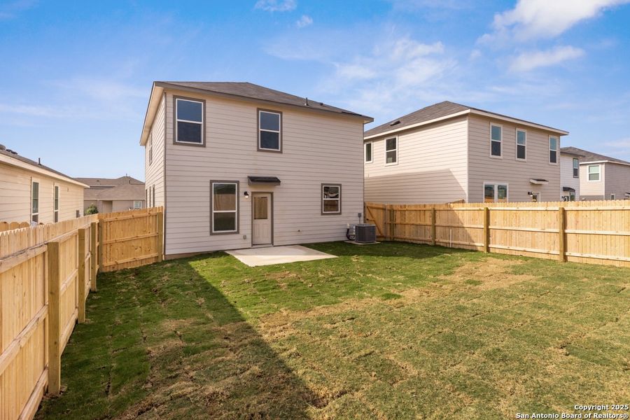 Exterior details and patio area of a home in Southton Cove, Elmendorf (Image 3). Exterior details and patio area of a home in Southton Cove, Elmendorf (Image 3).