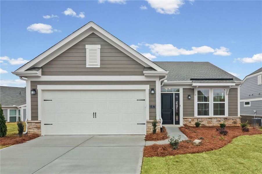 Front exterior of a new home in Laurel Farms, Dallas, GA, highlighting curb appeal (Image 22).
