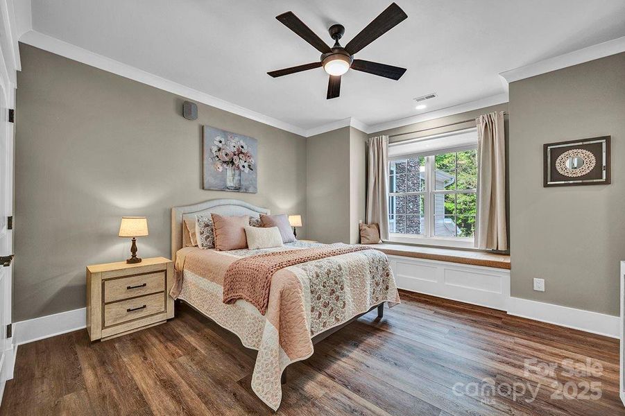 2nd floor guest room--shares a bathroom with another identical design bedroom. Window seats in both.