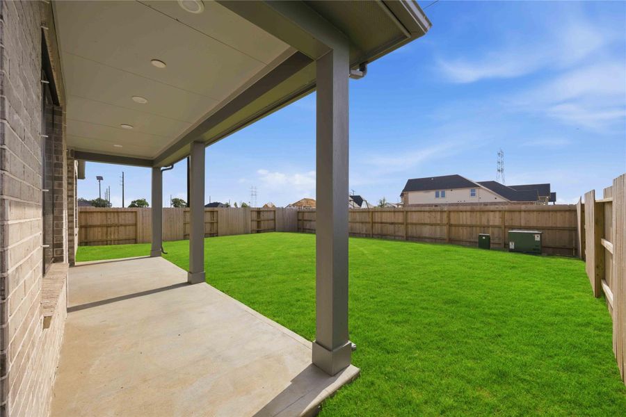 Exterior details and patio area of a home in Ellwood, Iowa Colony (Image 26). Exterior details and patio area of a home in Ellwood, Iowa Colony (Image 26).
