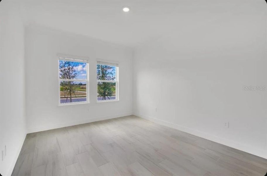 Spacious, unfurnished interior of a new home in Harvest at Ovation, Winter Garden (Image 9). Spacious, unfurnished interior of a new home in Harvest at Ovation, Winter Garden (Image 9).