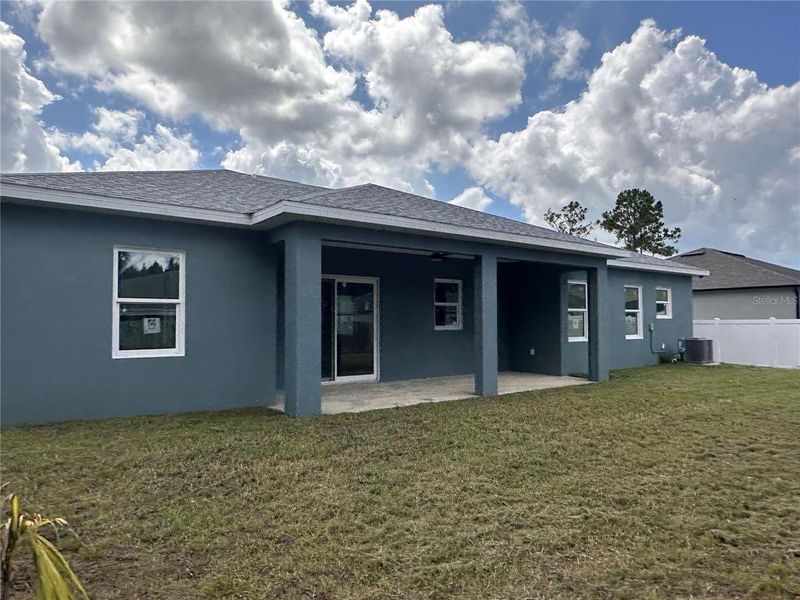 Front exterior of a new home in , Palm Bay, FL, highlighting curb appeal (Image 24). Front exterior of a new home in , Palm Bay, FL, highlighting curb appeal (Image 24).