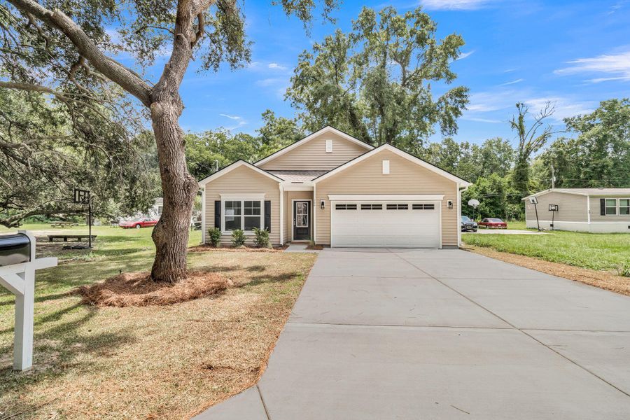 Front exterior of a new home in , Summerville, SC, highlighting curb appeal (Image 24). Front exterior of a new home in , Summerville, SC, highlighting curb appeal (Image 24).
