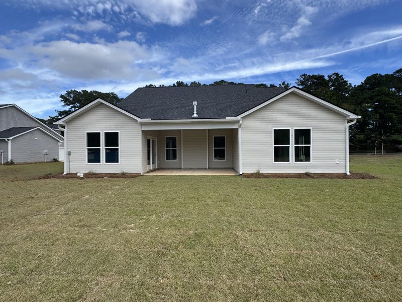 Exterior details and patio area of a home in Central Estates, Summerville (Image 3).