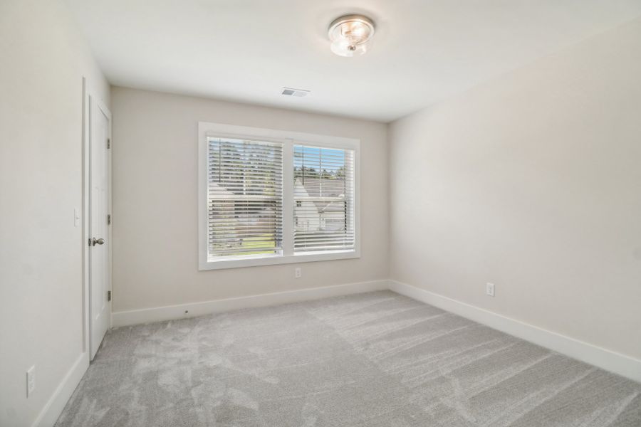Representative unfurnished interior of a home built from the Sonoma II by Great Southern Homes in Edwards Ridge, Central (Image 34).