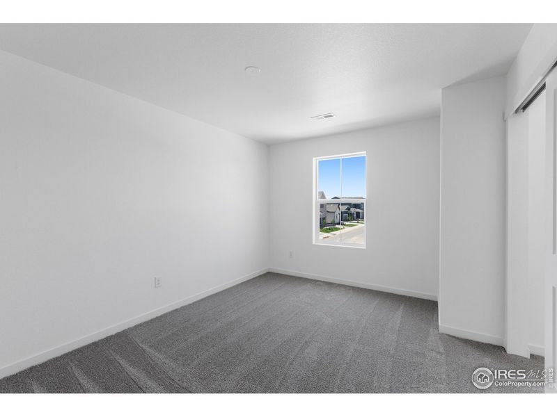 Spacious, unfurnished interior of a new home in Granary, Johnstown (Image 23).