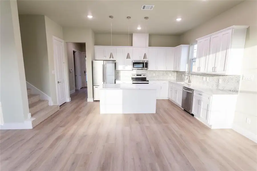 Furnished interior view inside a new home in , Fort Worth (Image 5).