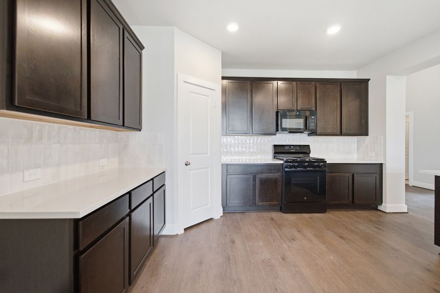 Furnished interior view inside a new home in Ashland, Angleton (Image 8).