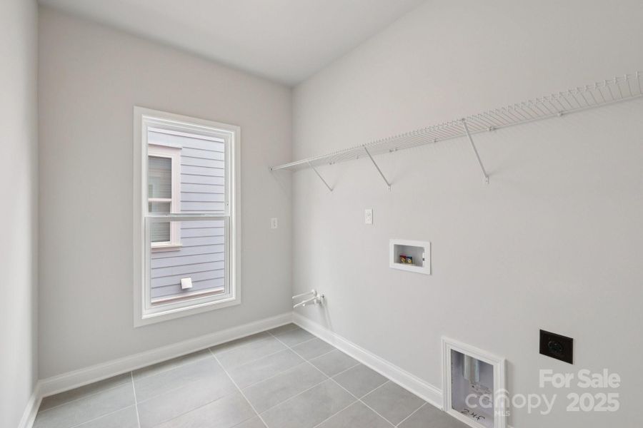 Spacious, unfurnished interior of a new home in Walk23, Huntersville (Image 28).