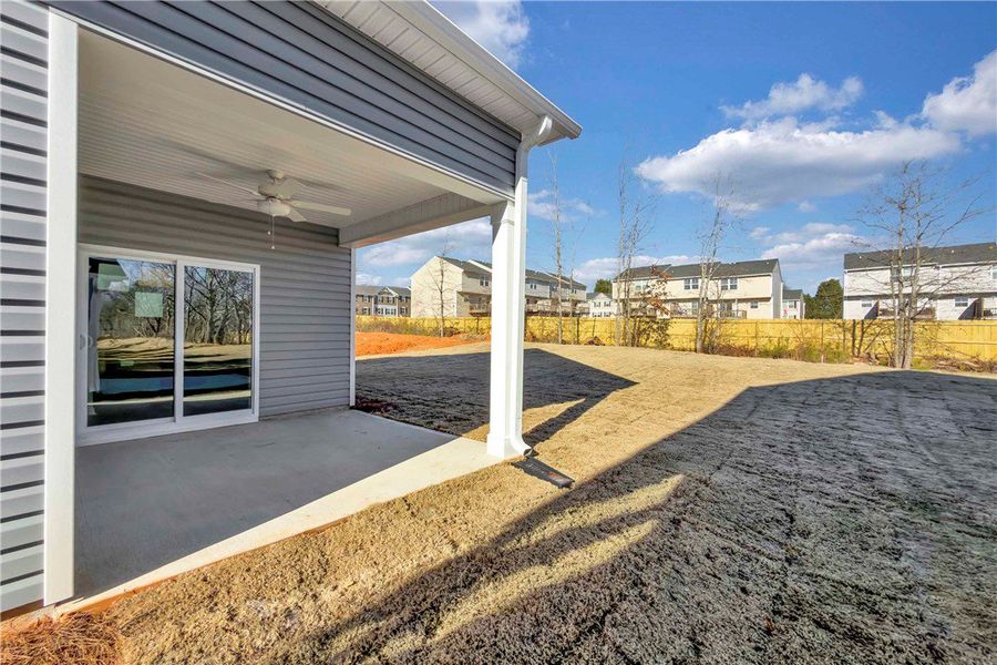 Exterior details and patio area of a home in Brownstone Park, Easley (Image 4).