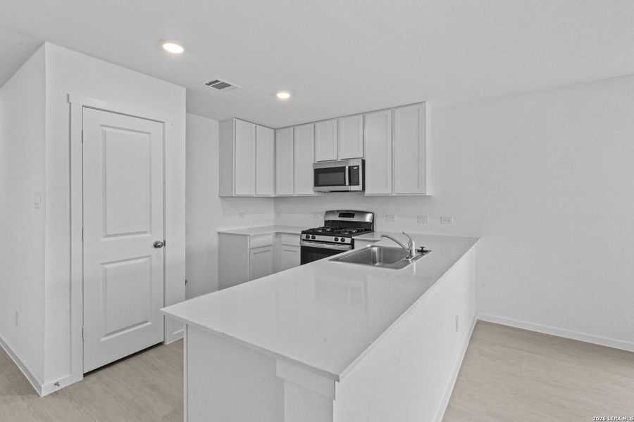 Furnished interior view inside a new home in Spring Grove, St. Hedwig (Image 7).