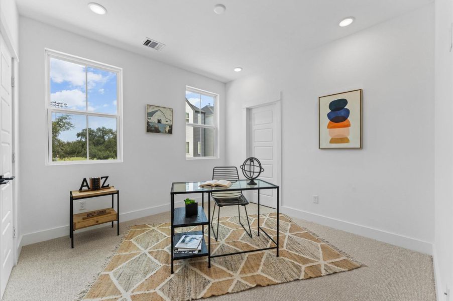 This charming secondary bedroom connects to a thoughtfully designed Jack and Jill bathroom, offering both privacy and shared convenience. Ideal for siblings or guests, the room features soft natural light, plush carpeting, and a spacious closet. The adjoining bathroom includes dual vanities, a tub-shower combo, and separate entrances from two bedrooms—making morning routines a breeze while maintaining personal space. A smart layout that blends function, style, and flexibility.