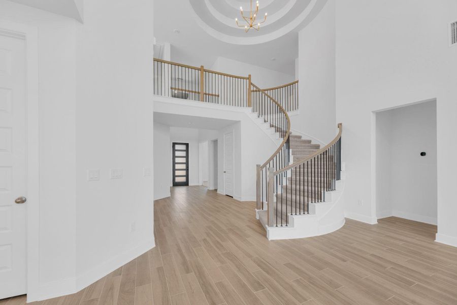 Spacious, unfurnished interior of a new home in Santa Rita Ranch - 60', Liberty Hill (Image 14). Spacious, unfurnished interior of a new home in Santa Rita Ranch - 60', Liberty Hill (Image 14).