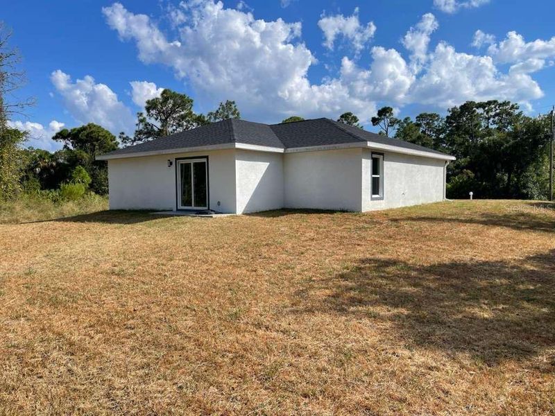 Exterior details and patio area of a home in , Port Charlotte (Image 2). Exterior details and patio area of a home in , Port Charlotte (Image 2).