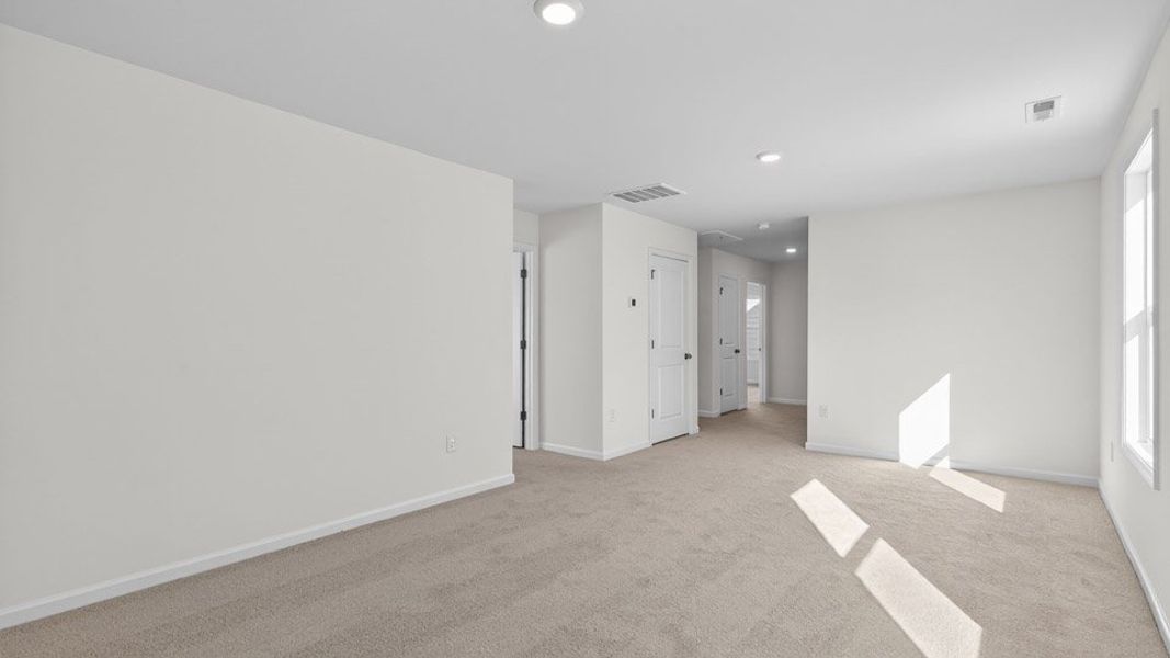 Spacious, unfurnished interior of a new home in The Estates Park, Apex (Image 18).