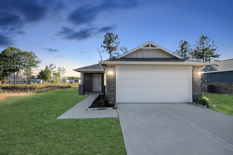 Front exterior of a new home in , Cleveland, TX, highlighting curb appeal (Image 1).