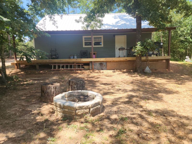 Exterior details and patio area of a home in , Coldspring (Image 23). Exterior details and patio area of a home in , Coldspring (Image 23).