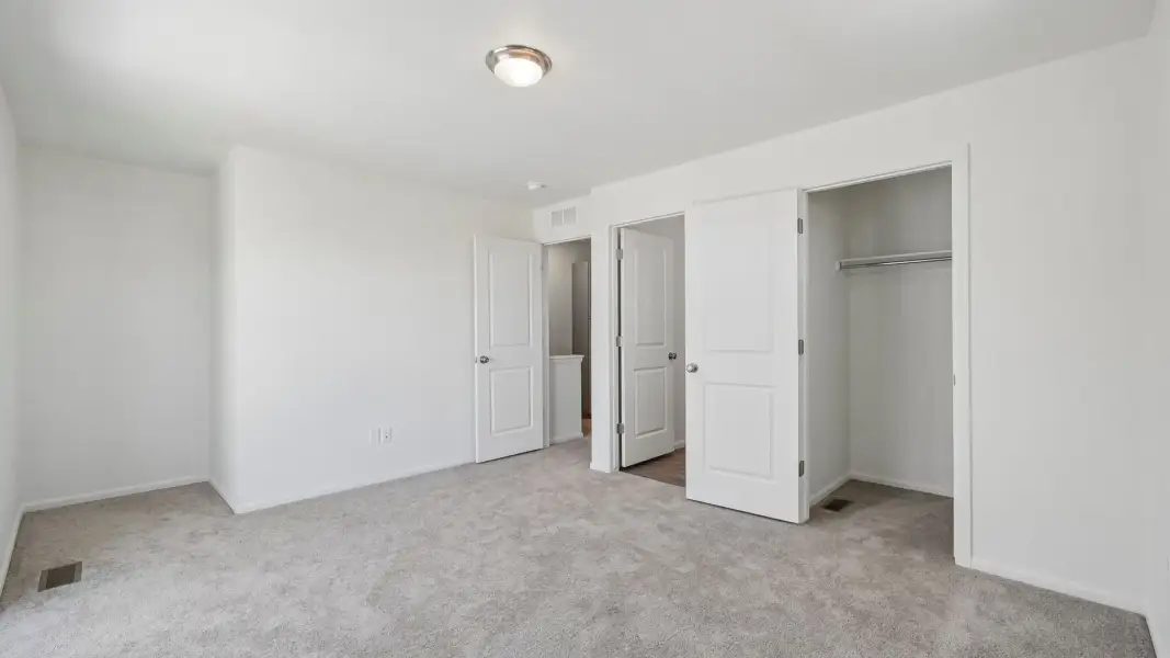 Spacious, unfurnished interior of a new home in Banning Lewis Ranch, Colorado Springs (Image 12).