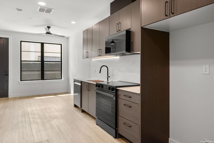 Furnished interior view inside a new home in , New Braunfels (Image 12).