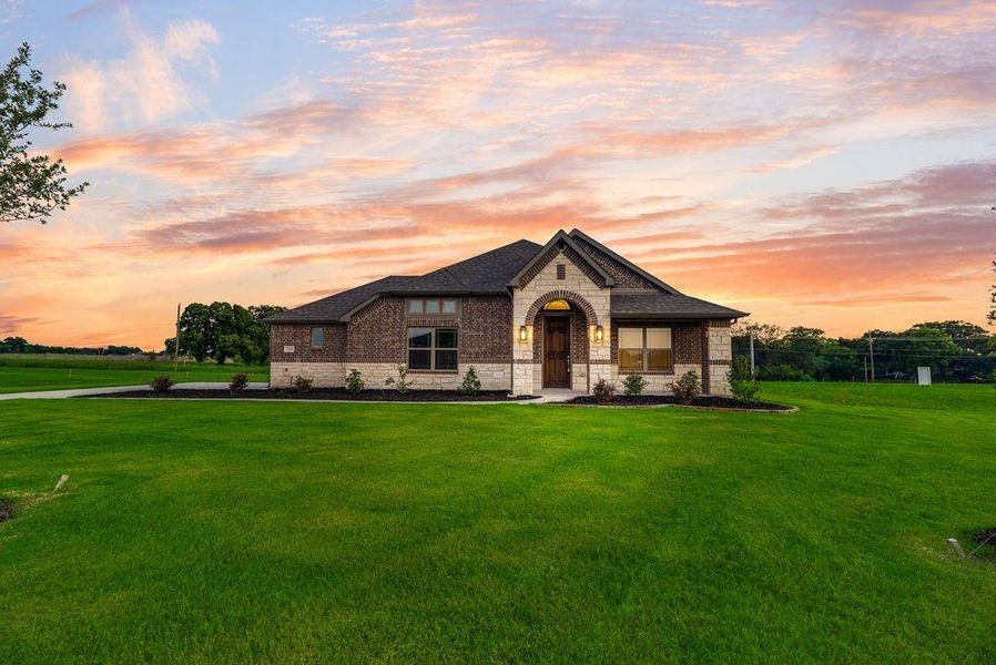 Front exterior of a new home in , Lowry Crossing, TX, highlighting curb appeal (Image 17).